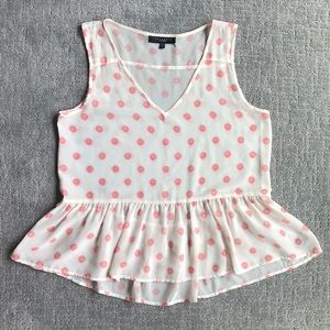 Polka dot sheer peplum top